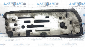 Left underbody protection for a 1994 Honda Accord hybrid, scuffed, torn mount