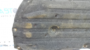 Left underbody protection for a 1994 Honda Accord hybrid, scuffed, torn mount