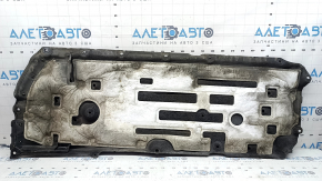 Right underbody protection for a 2014-17 Honda Accord hybrid, worn, with a broken mount.