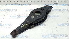 The lower control arm under the rear right spring of a Toyota Rav4 15-18 is rusty, the silent block needs replacing.