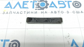 The ECOBOOST AWD emblem on the Ford Edge 19-24 tailgate has peeled off.