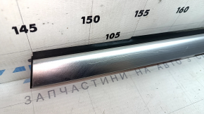 Kia Sportage 23-26 center rear left door molding, chrome, scratches