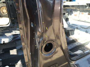 The center right body pillar of a 13-17 Honda Accord has dents on the body.