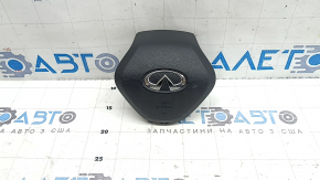 The driver's side airbag in the steering wheel of the Infiniti QX50 19-20 is black and the mount is broken.