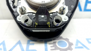 The driver's side airbag in the steering wheel of the Infiniti QX50 19-20 is black and the mount is broken.
