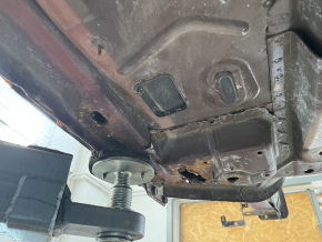 Front left quarter panel of a 19-24 Ford Edge on the body, burgundy, rusty, torn