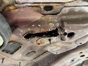 Front right quarter panel of a 19-24 Ford Edge on the body, burgundy, rusty, torn