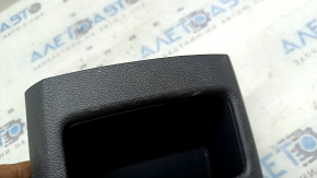 Kia Sportage 23-26 black, worn rear lower center console trim
