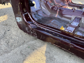 Front left quarter panel of a 19-24 Ford Edge on the body, burgundy, rusty, torn