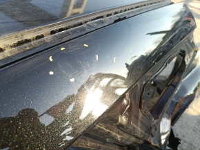 Metal roof for a Kia Sportage 23-26 without panoramic windows and roof rails, with dents and bumps on the body.