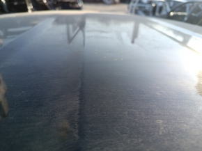 Metal roof for a Kia Sportage 23-26 without panoramic windows and roof rails, with dents and bumps on the body.