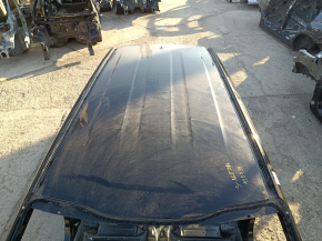 Metal roof for a Kia Sportage 23-26 without panoramic windows and roof rails, with dents and bumps on the body.