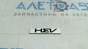The Kia Sportage 23-26 trunk door HEV emblem