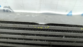 The Infiniti QX50 19-25 intercooler is dented and the mount is broken.