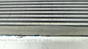 The Infiniti QX50 19-25 intercooler is dented and the mount is broken.