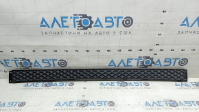 Mercedes H247 GLA 20-23 front bumper center trim without parking sensors, faded plastic, dented