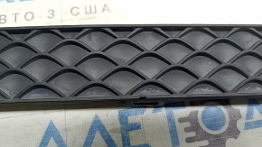 Mercedes H247 GLA 20-23 front bumper center trim without parking sensors, faded plastic, dented