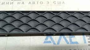Mercedes H247 GLA 20-23 front bumper center trim without parking sensors, faded plastic, dented