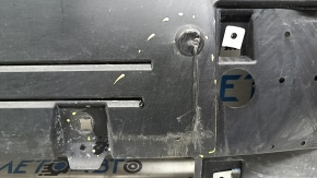 The front bumper guard of the Mercedes H247 GLA 20-23 is pressed and worn.