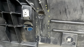 The front bumper guard of the Mercedes H247 GLA 20-23 is pressed and worn.