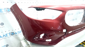 Front bumper, bare, Mercedes H247 GLA 20-23, without parking sensors, red, chipped, paint blistered, damaged mount, repainted