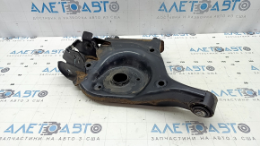 The lower control arm under the rear left Infiniti QX50 19-20 spring is rusty, the silent block needs replacing