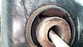 The rear subframe of the Infiniti QX50 19-25 AWD is rusty, with microcracks in the S/B, and a dented ear.