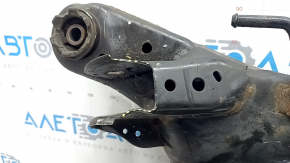 The rear subframe of the Infiniti QX50 19-25 AWD is rusty, with microcracks in the S/B, and a dented ear.
