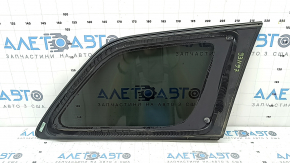 Rear left Jeep Grand Cherokee WK2 17-19 window with black molding, no antenna, worn molding