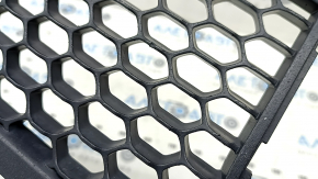 The lower grille of the front bumper of the Jeep Grand Cherokee WK2 17-22 is open, under the radar and hooks, broken, sand