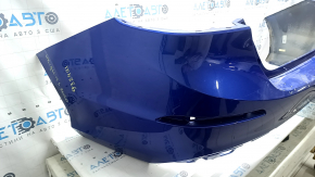 The rear bumper is bare for a Honda Insight 19-22 blue, 593M, dented, cracked, and the mount is broken.