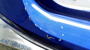 The rear bumper is bare for a Honda Insight 19-22 blue, 593M, dented, cracked, and the mount is broken.