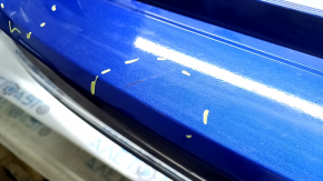 The rear bumper is bare for a Honda Insight 19-22 blue, 593M, dented, cracked, and the mount is broken.