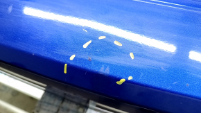 The rear bumper is bare for a Honda Insight 19-22 blue, 593M, dented, cracked, and the mount is broken.