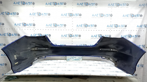 The rear bumper is bare for a Honda Insight 19-22 blue, 593M, dented, cracked, and the mount is broken.