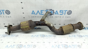 The exhaust pipe, the middle section with the catalytic converter, Honda Insight 19-22, has a torn mesh.