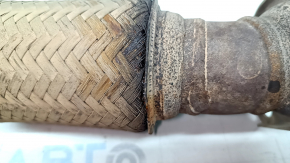The exhaust pipe, the middle section with the catalytic converter, Honda Insight 19-22, has a torn mesh.
