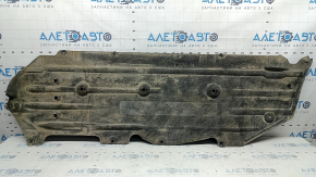 The right underbody protection of a Honda Insight 19-22 is worn and torn.