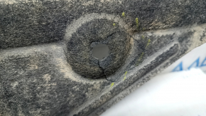 The right underbody protection of a Honda Insight 19-22 is worn and torn.