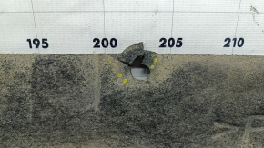 The right underbody protection of a Honda Insight 19-22 is worn and torn.