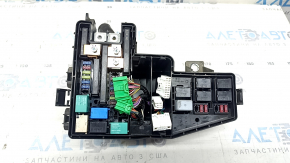 The underhood fuse box for a 19-20 Honda Insight is large, missing a cover and wiring, and the mount is broken.