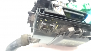The underhood fuse box for a 19-20 Honda Insight is large, missing a cover and wiring, and the mount is broken.