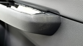 Honda CRV 23-26 black front left door panel, black leather armrest with orange stitching, glossy black molding, worn, butt
