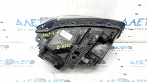 Jeep Grand Cherokee WK2 16-18 xenon front left headlight assembly, dark, no washer, deposits on the inside of the glass