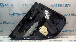 The door trim panel, rear right, Toyota Rav4 19-24, is black, the armrest is black leather, the insert is black plastic, chrome molding, scuffs