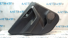 The door trim panel, rear left, Toyota Rav4 19-24, is black, the armrest is black leather, the insert is black plastic, chrome molding, scuffs