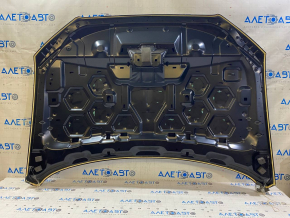 The bare hood of a 1999 Lincoln MKC