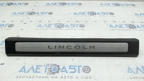 Lincoln MKZ 17-20 front left door sill plate, chrome with backlight, black, scratches