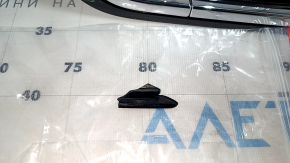 The Nissan Rogue 21-23 grille under the camera is broken off.