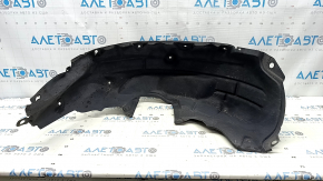 The rear left fender liner of a Toyota Venza 21-24 has torn fasteners.